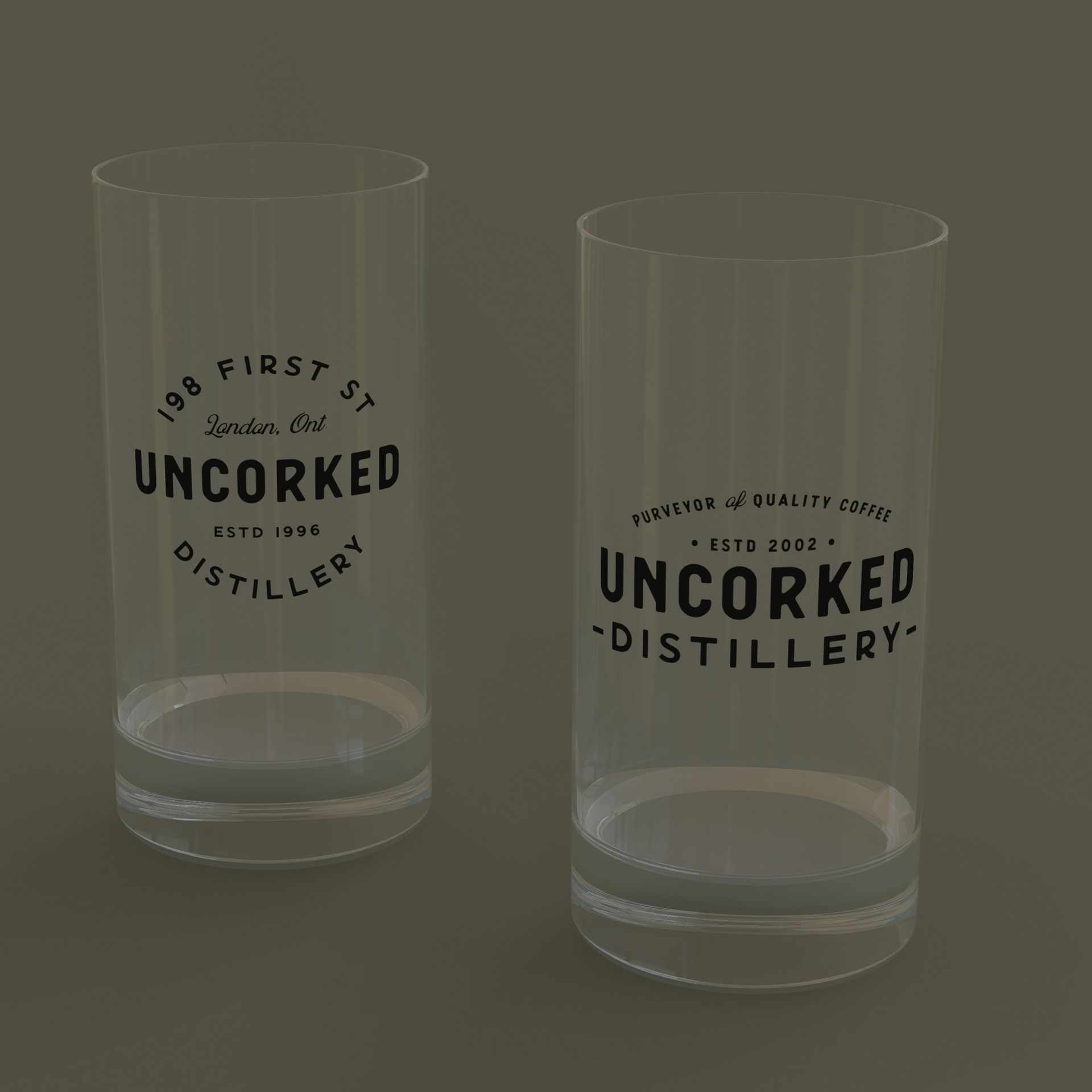 Two glasses that say uncorked distillery on them