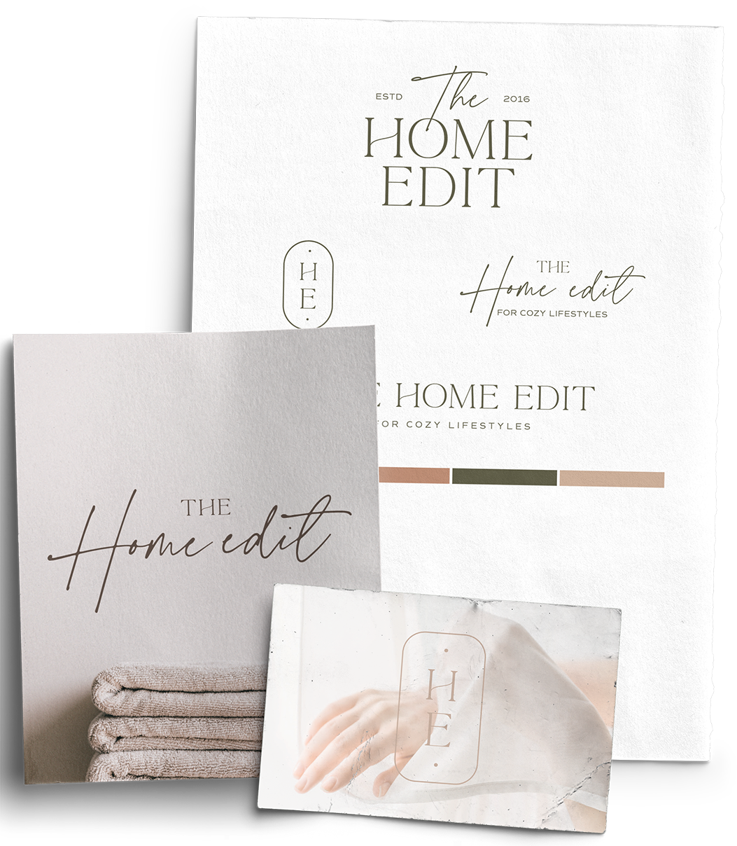 A stack of towels sits next to a book titled the home edit