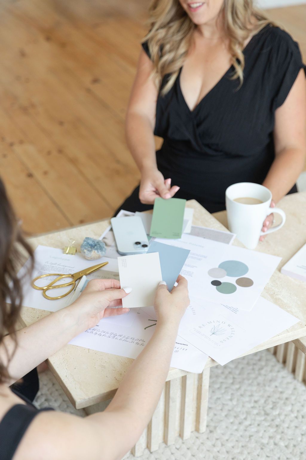 Lume creative at a desk building a brand for a small business