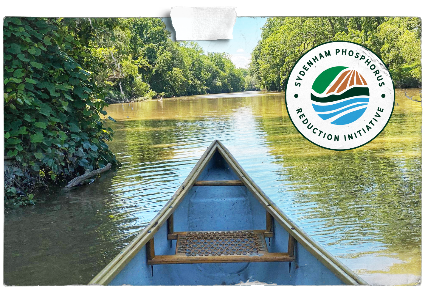A picture of a canoe on a river with a logo that says phosphorus reduction initiative