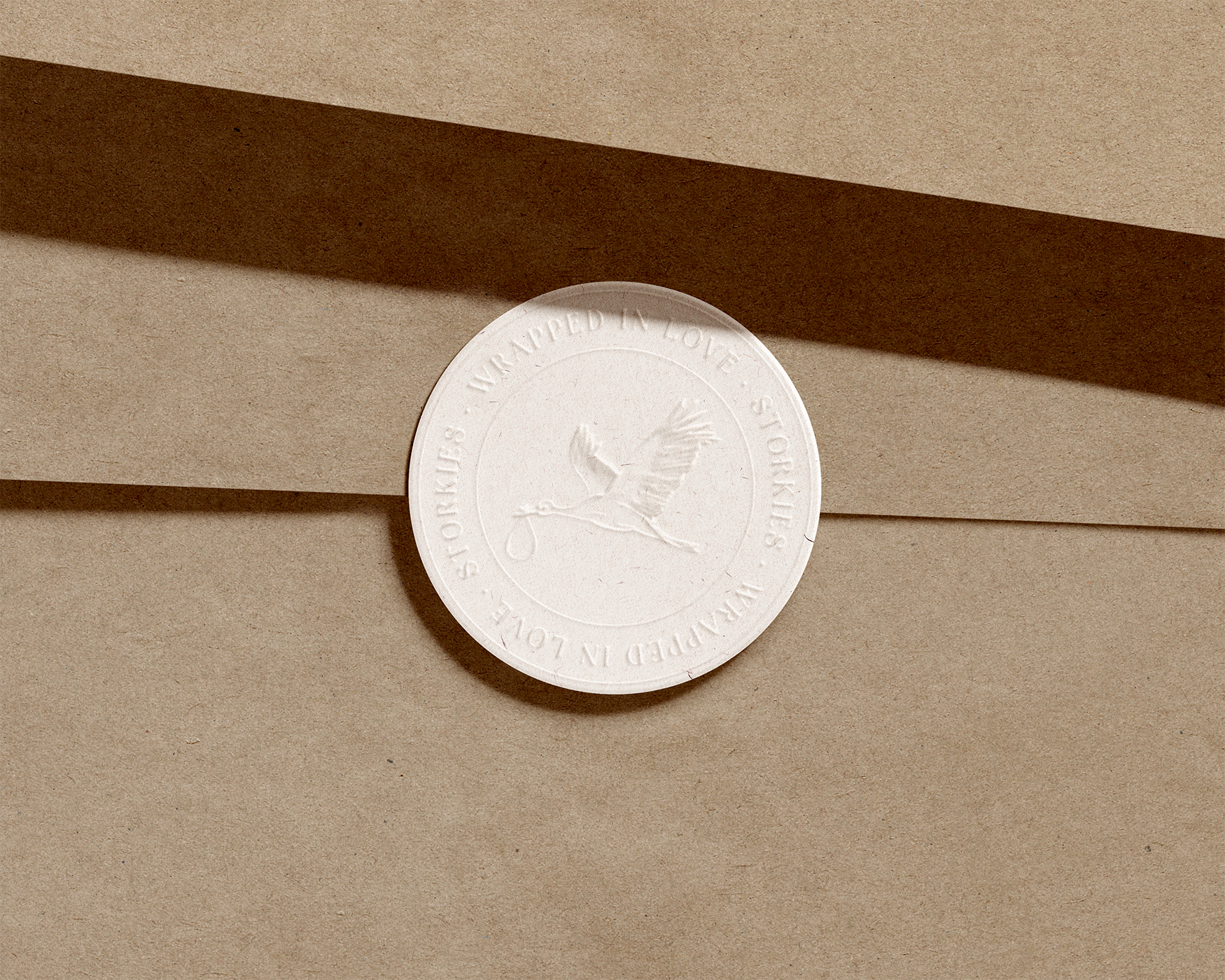 A brown envelope with a white seal on it.
