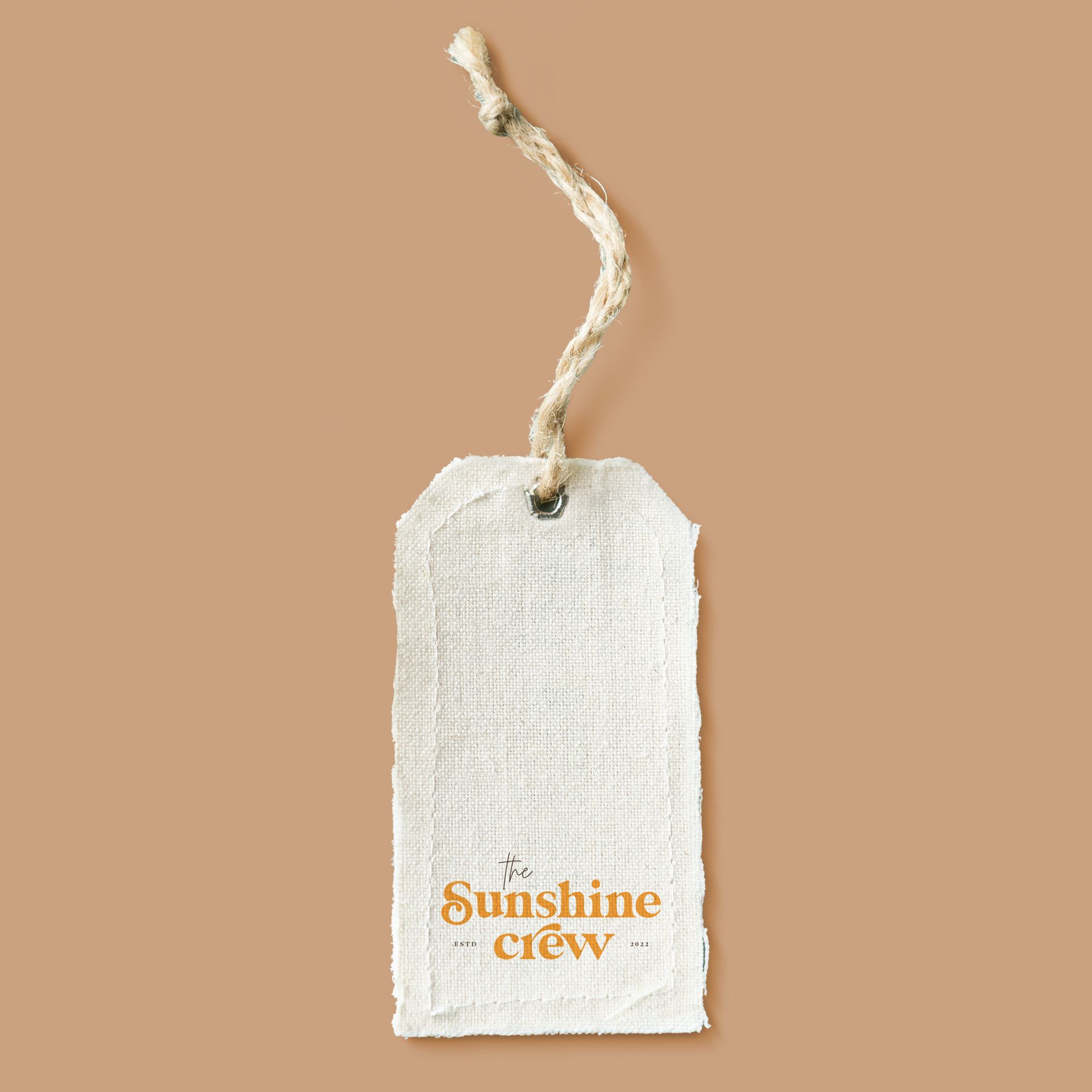 A white tag with the words `` to sunshine crew '' written on it.