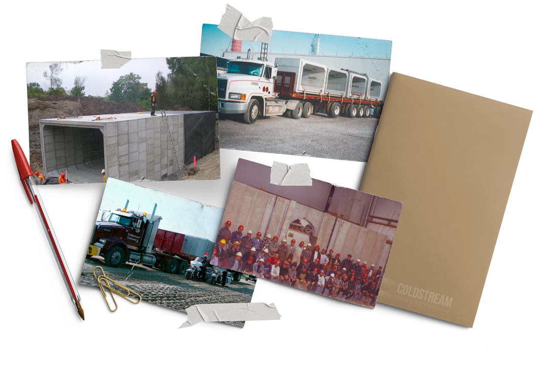 A bunch of pictures are taped to a wall including one of a truck