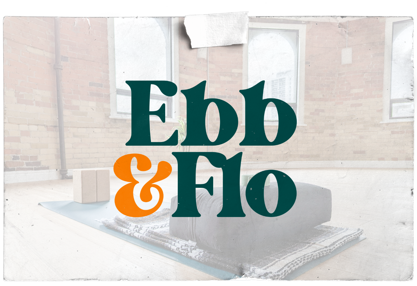 A logo for ebb & flo with a couch in the background
