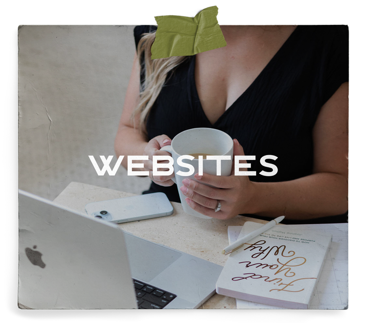 A woman is holding a cup of coffee while using a laptop to create custom websites