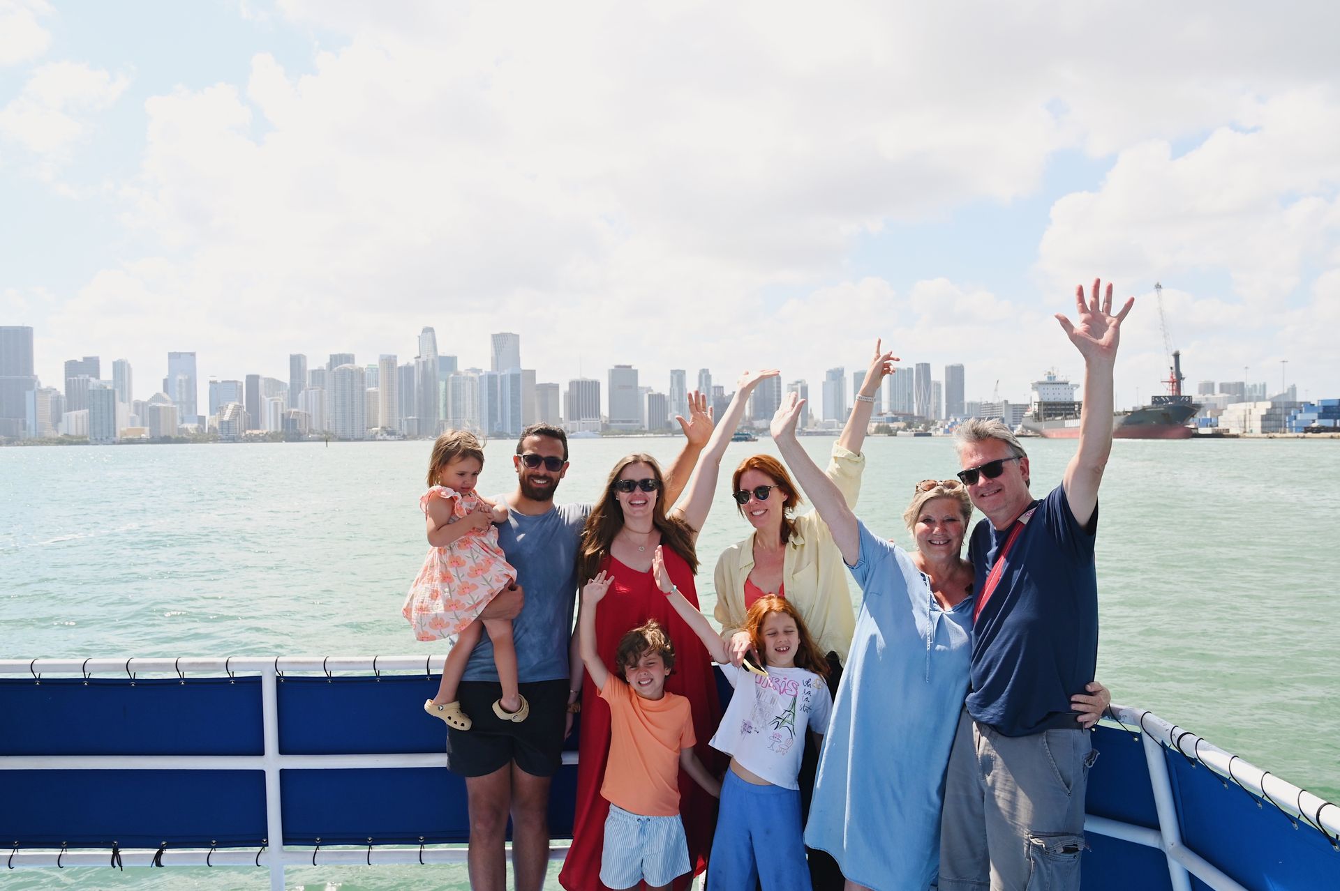 Miami tours in Miami, the boat tour from bayside Happy Passengers with the Miami Skyline in the background on the Miami boat tour