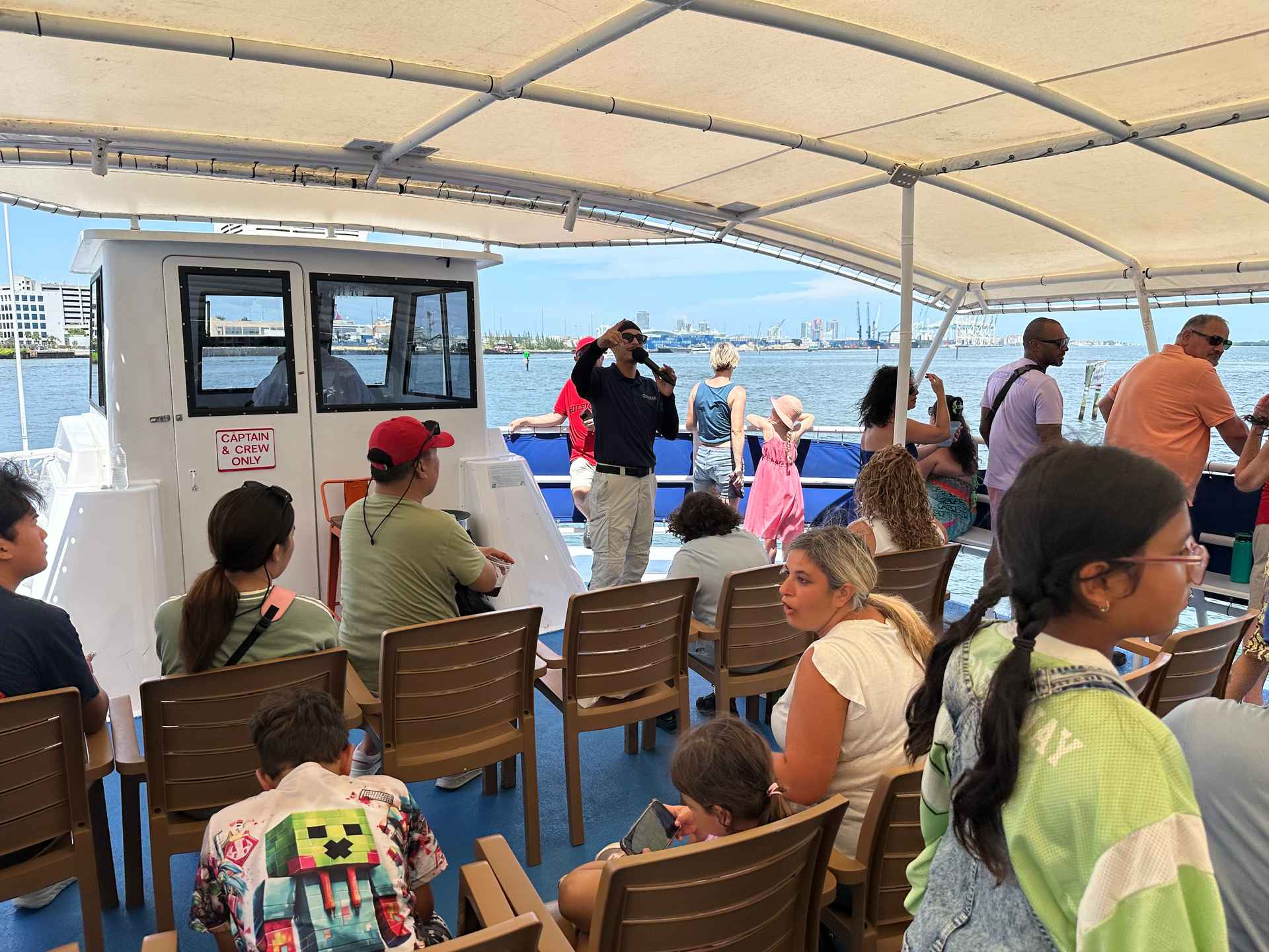 Tour Guide on the Bayside Sightseeing Cruises doing the tour