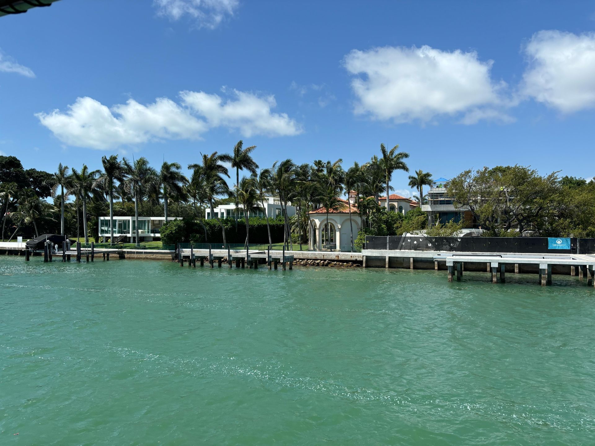 Star Island waterfront mansion viewed on a Bayside boat ride using a Miami boat cruise promo deal
