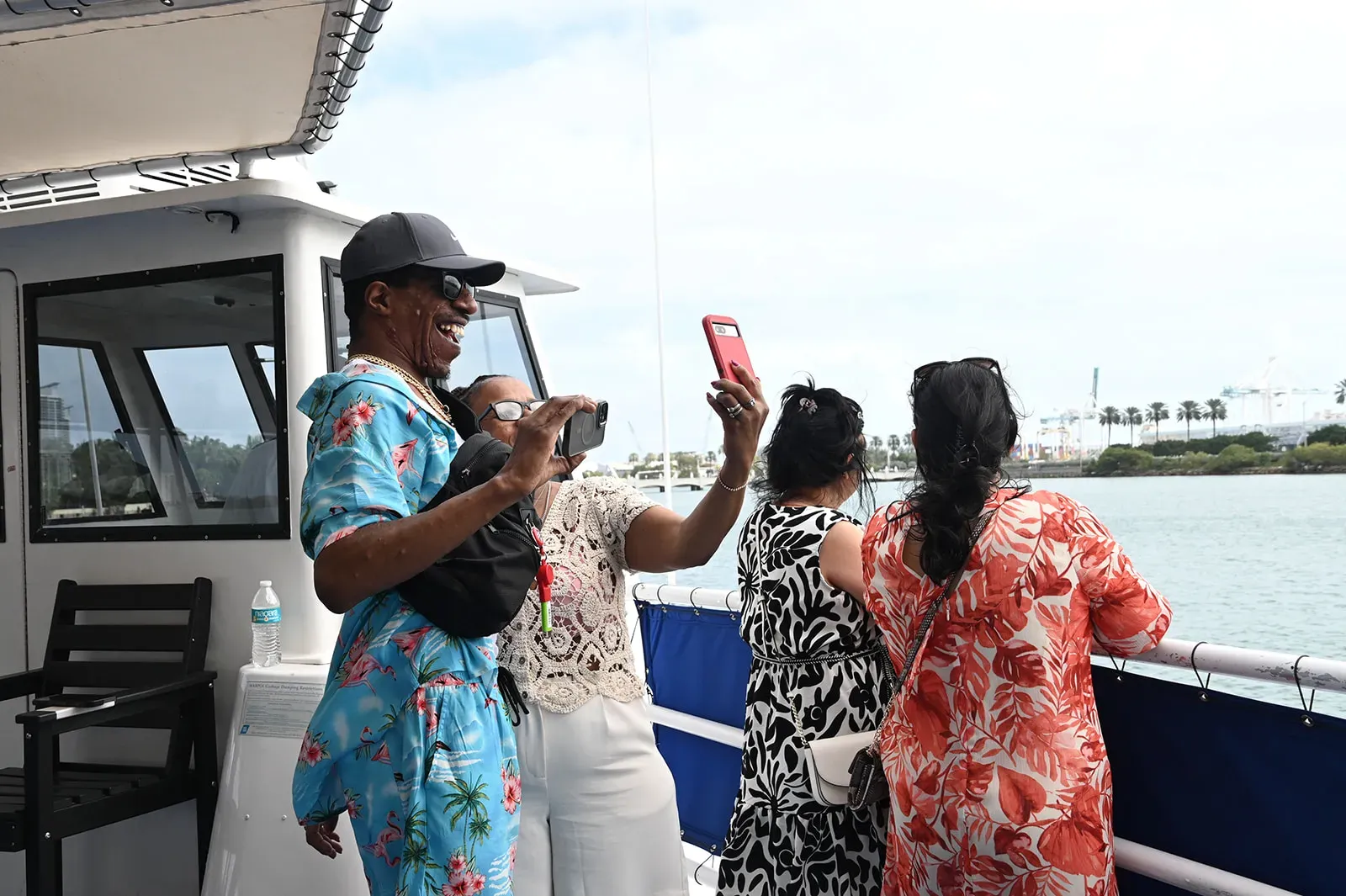 Miami boat tours experience in Biscayne Bay with guests enjoying the skyline