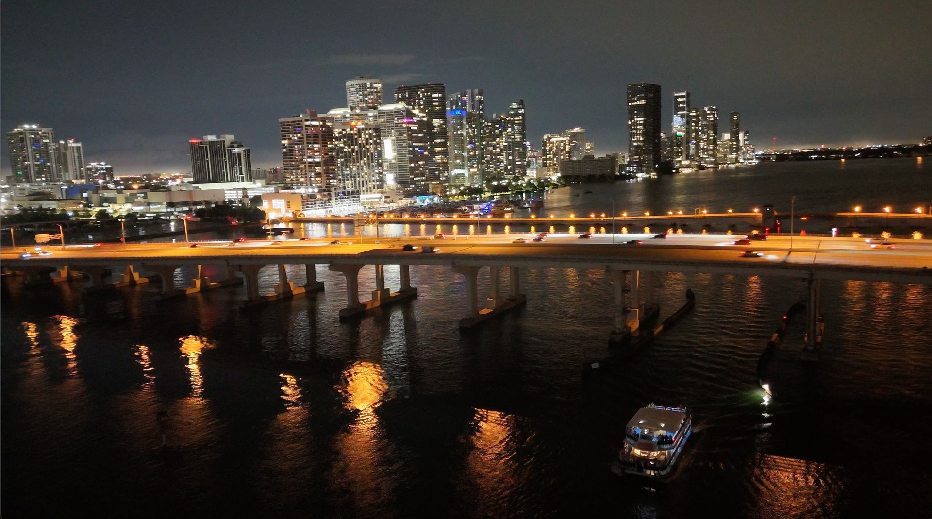 Downtown Miami Skyline seen from the Miami Evening Boat Tour with skyline night time views from the water. 