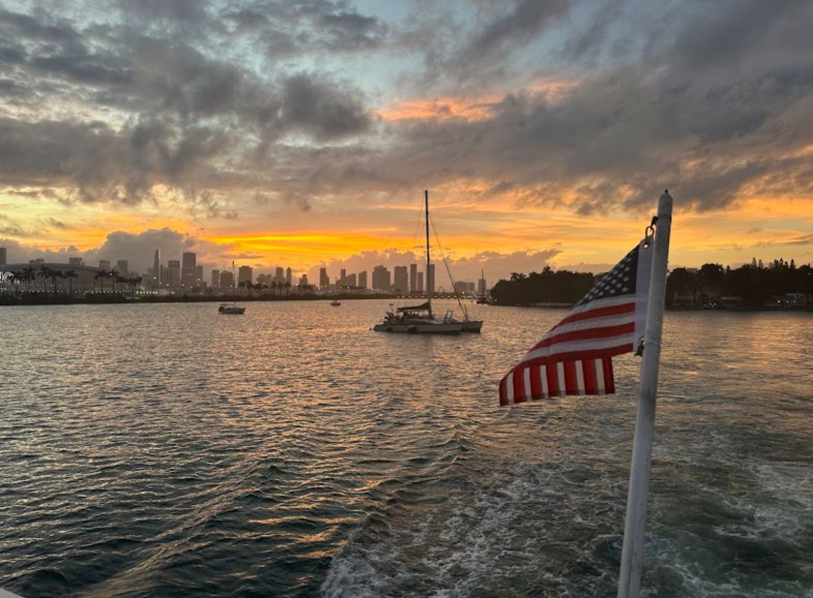 Biscayne Bay Sunset Cruise with the skyline of Miami behind it