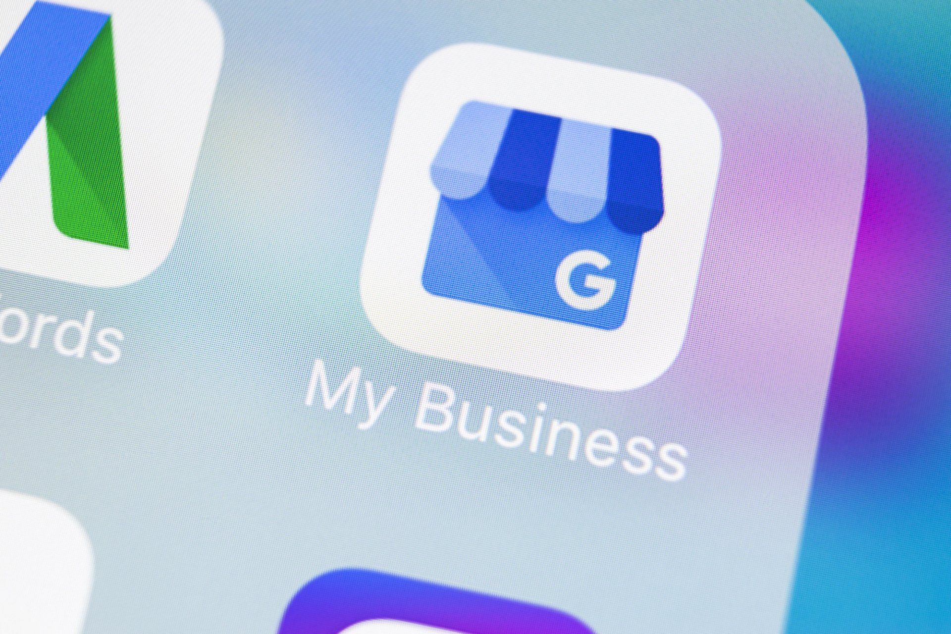 A close up of the google my business app on a cell phone.