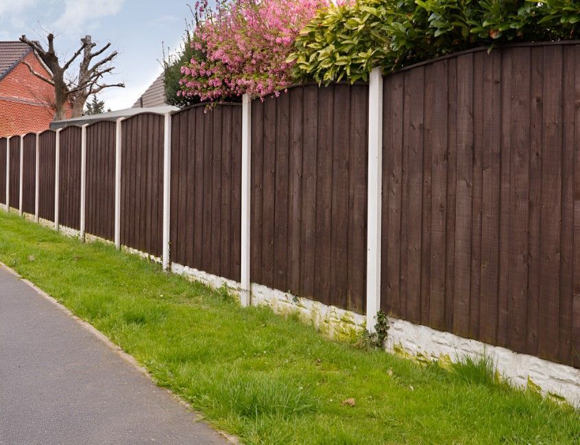 There is a Wooden Fence Along the Side of the Road — Harbour Fencing In Moonee Beach, NSW