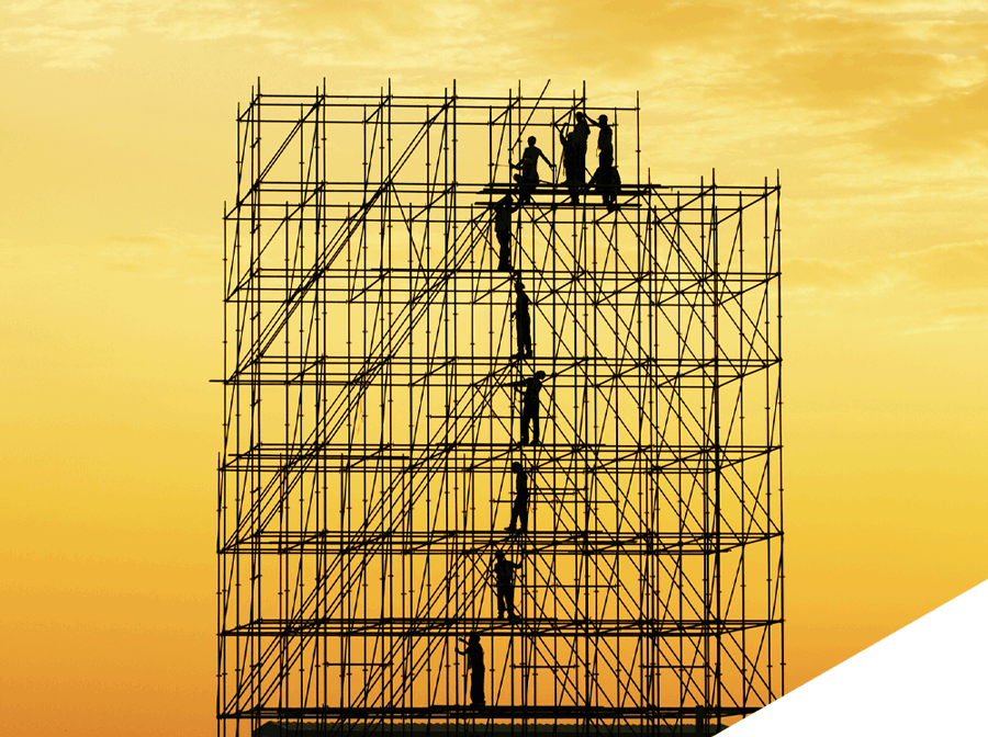 Workers in scaffolding with yellow background | Port Campbell, VIC | Southern Rigging & Scaffolding
