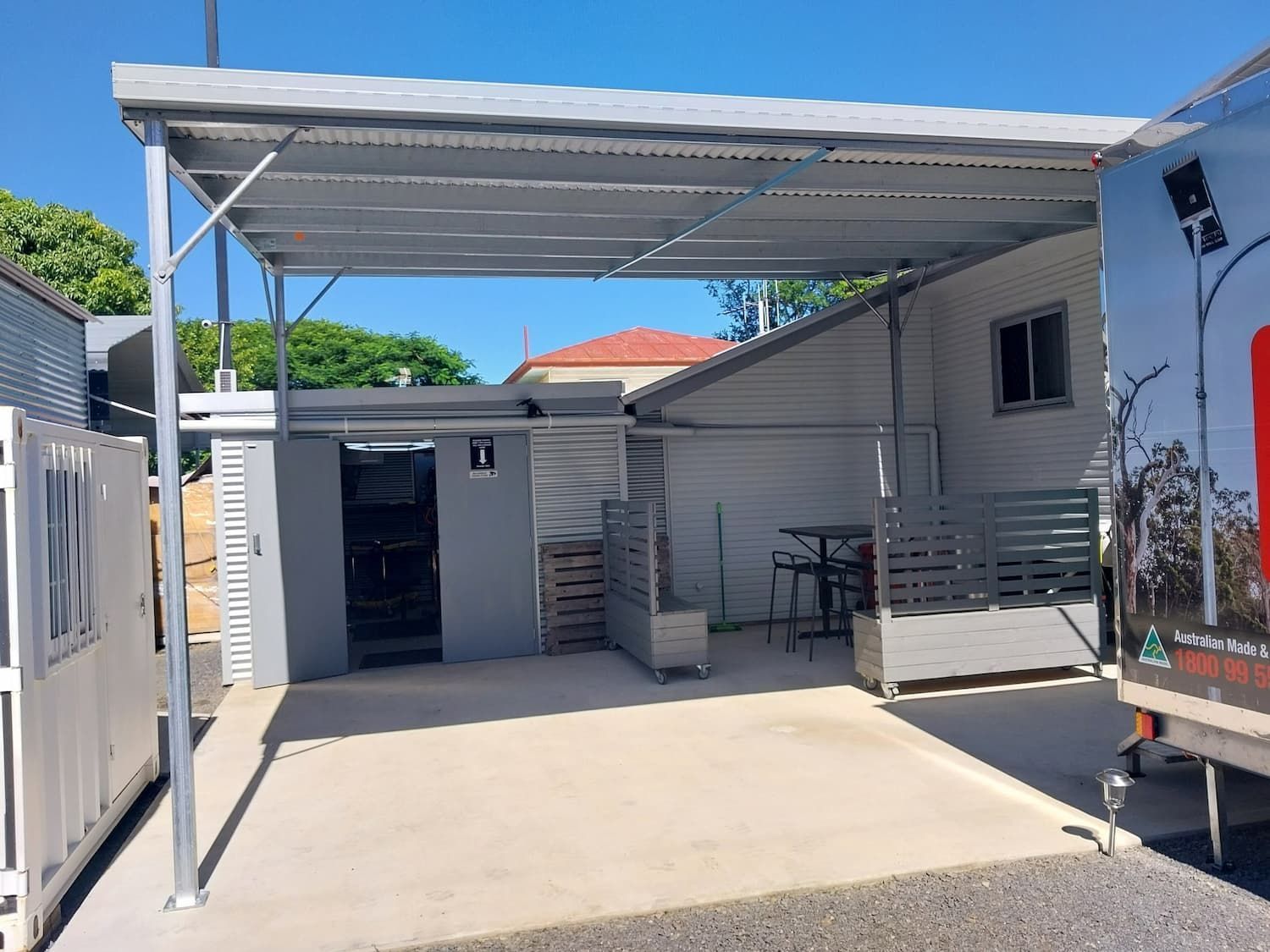 A Carport in Front of a Building — Steel Homes Australia in Branyan, QLD
