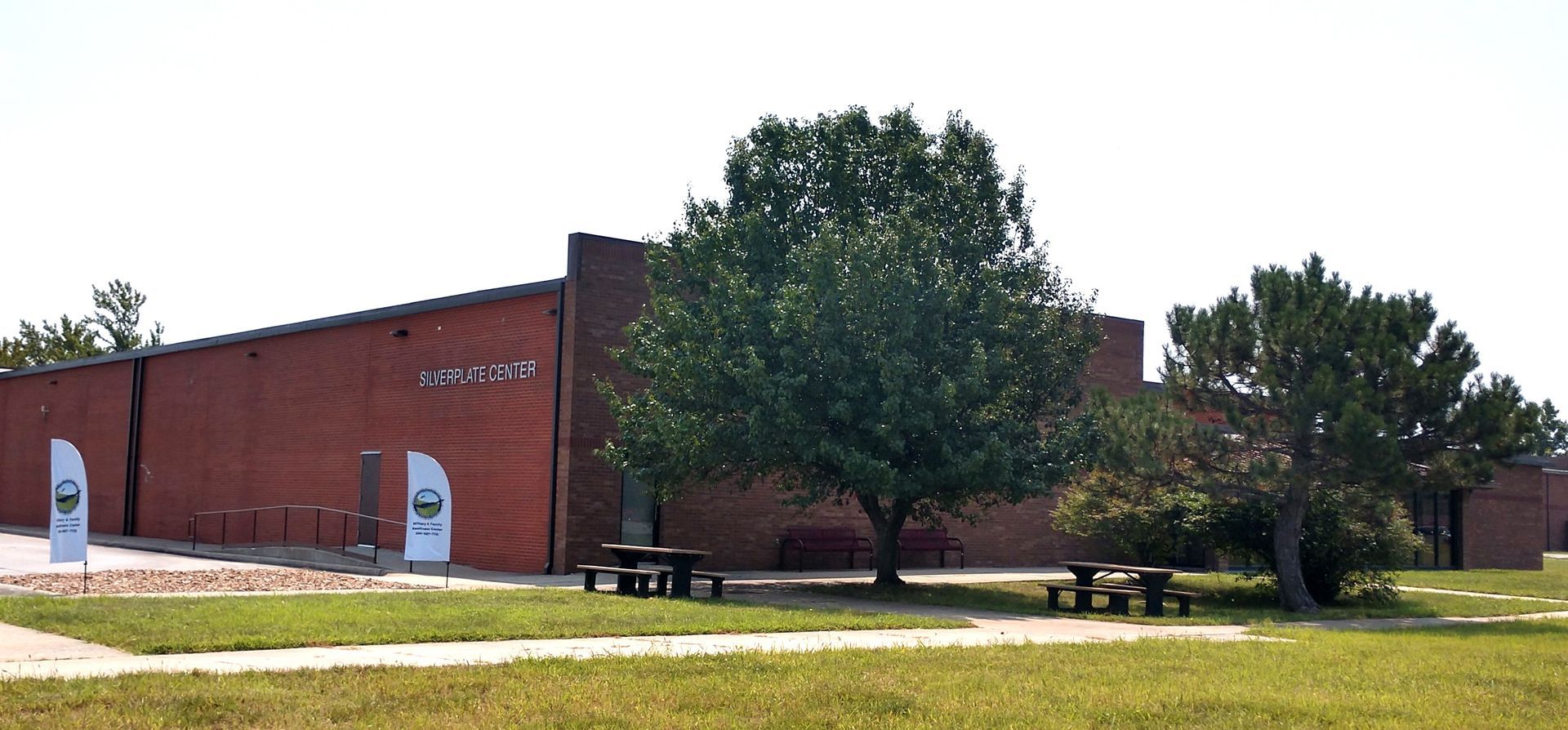 A large red brick building with the number 1371 on it