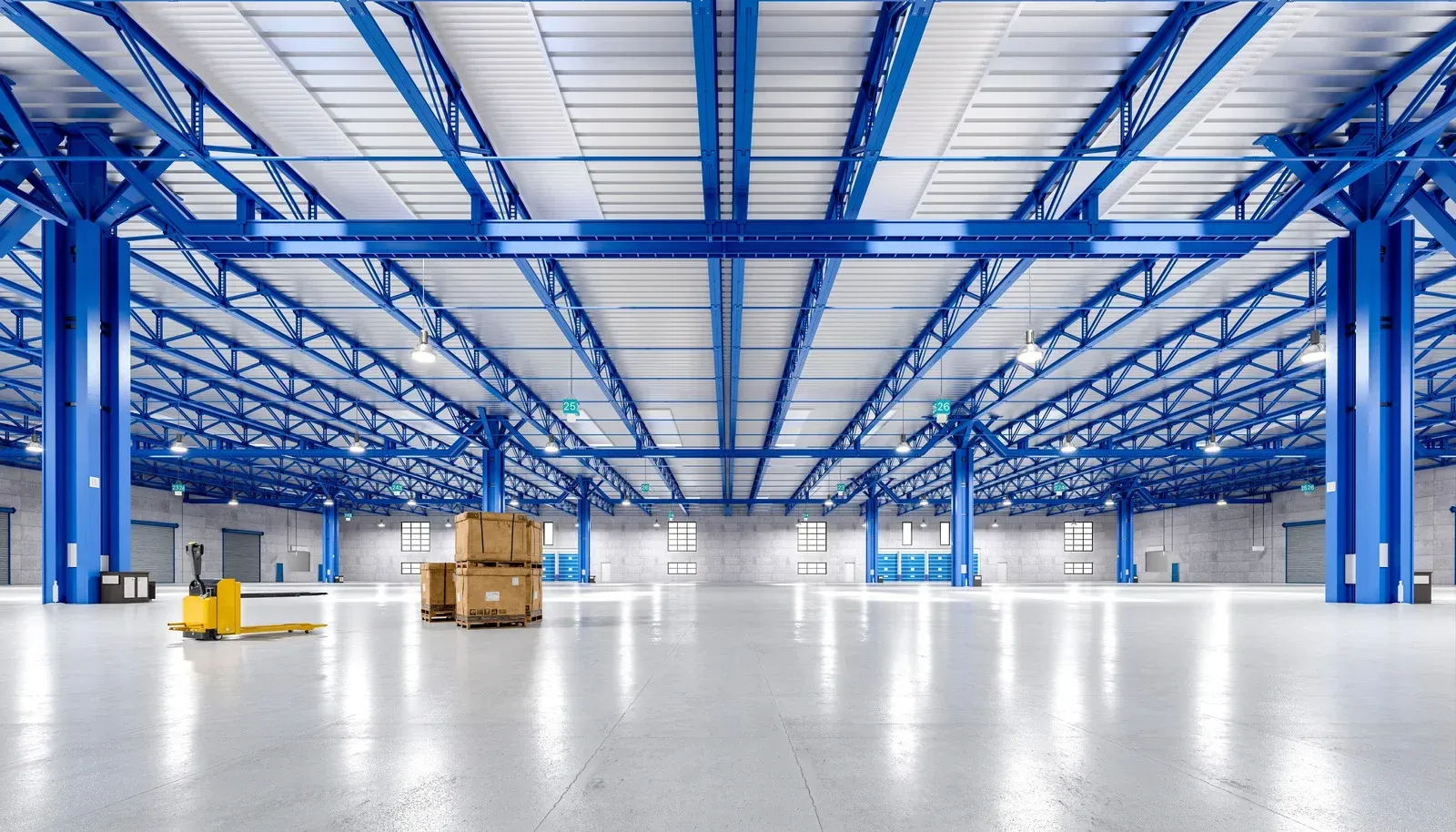 A large empty room with a wooden wall and a tiled floor.