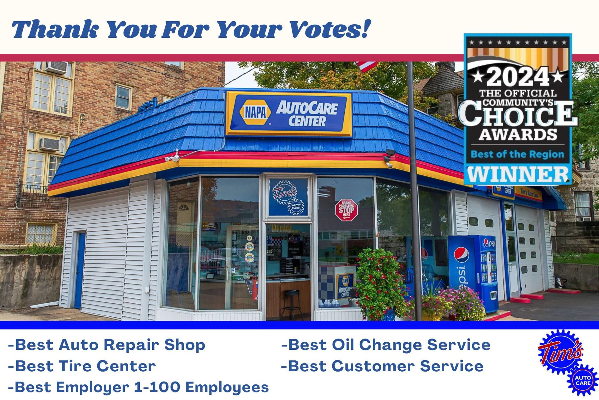 NAPA AutoCare Center building with blue roof and awards: 