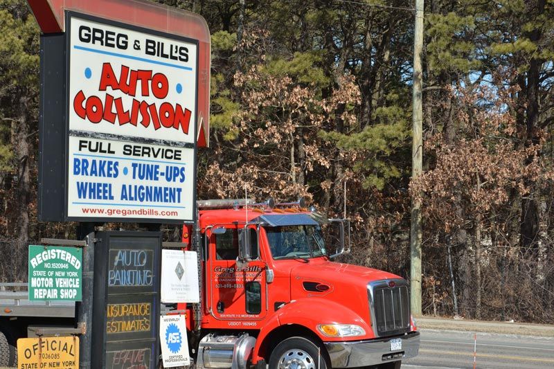 Our tow truck - towing services - Greg & Bill's Auto Collision and Diagnostic Car Care in Medford NY