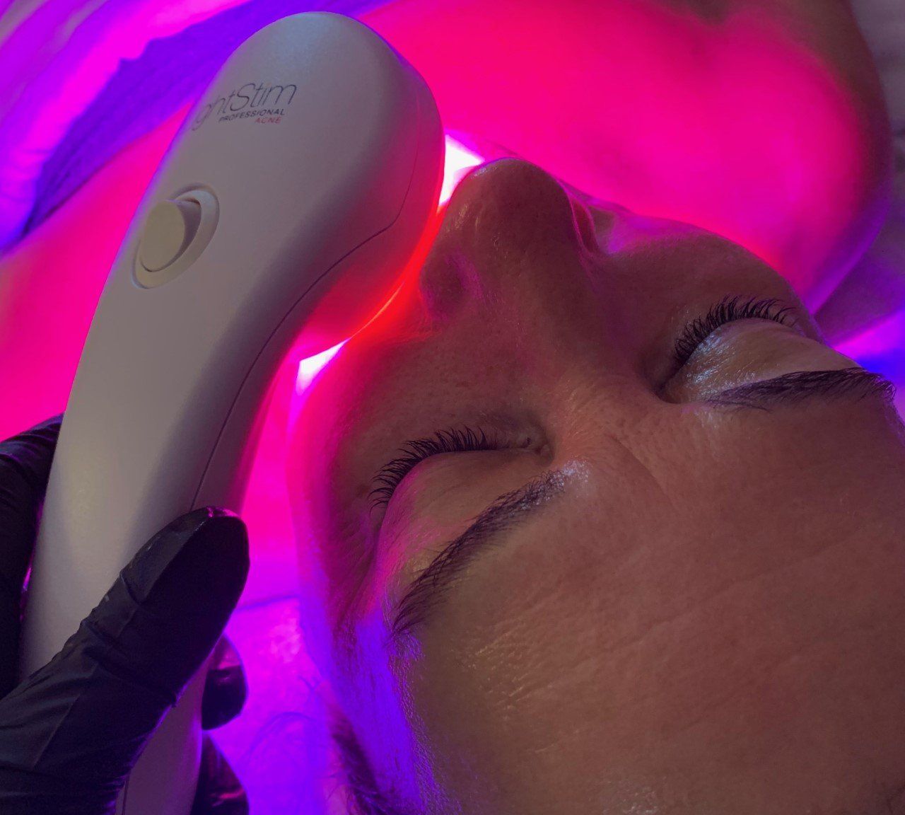 Applying a Mask from Clay to the Face of a Beautiful Woman — Hickory, NC — Polished From Head to Toe