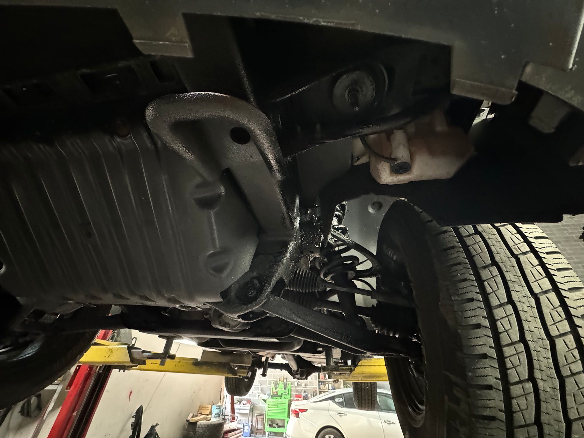 Car on a Lift in Repair Shop — Sterling, VA — Elite Auto Repair & Collision Center, LLC