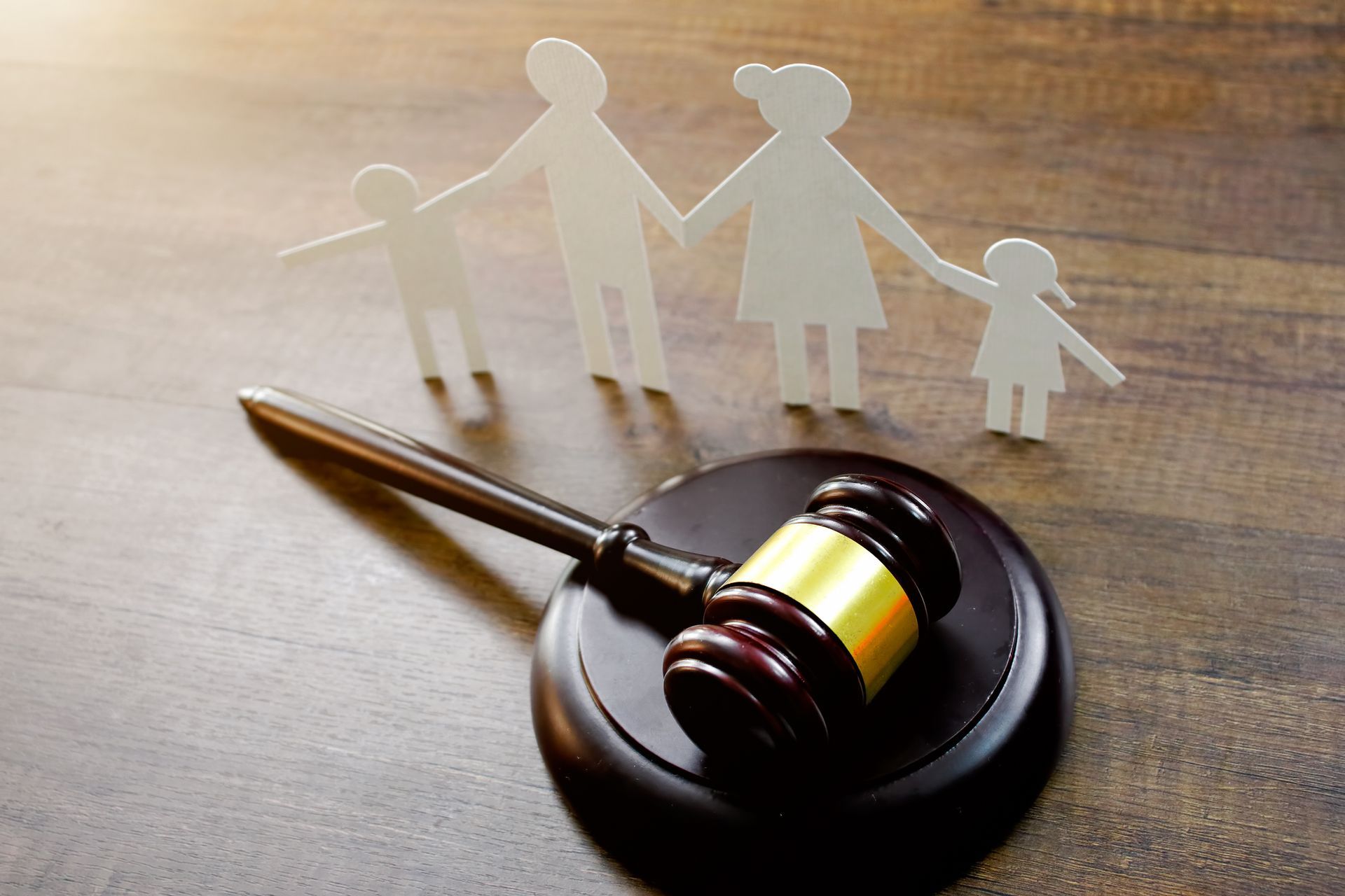 Family Paper and Judge gavel on the table.