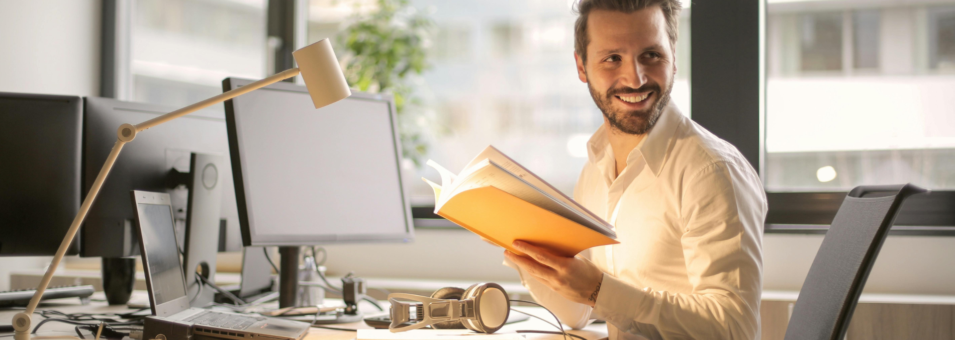 Picture of a man at a desk. 