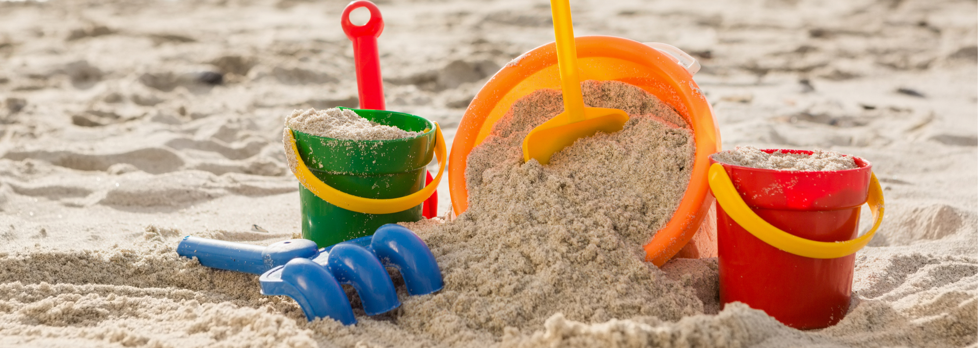 Picture of a bucket and a spade in a sandbox. Picture of a bucket and a spade in a sandbox.
