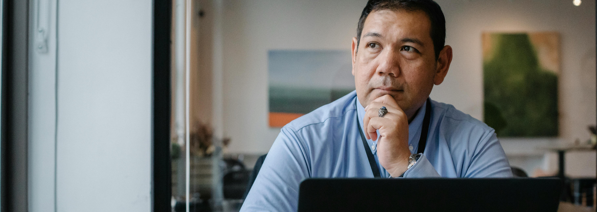 Picture of a person thinking over his options. 