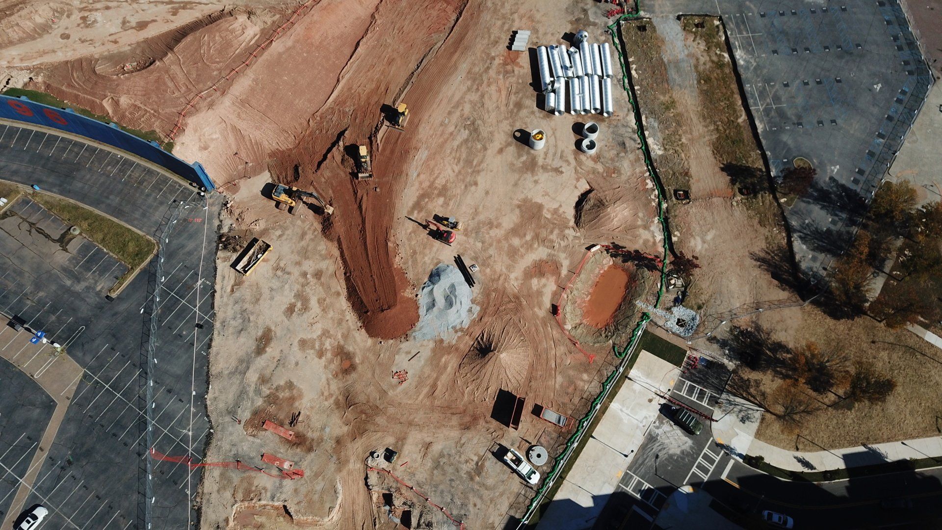 An aerial view of a construction site with a lot of dirt.