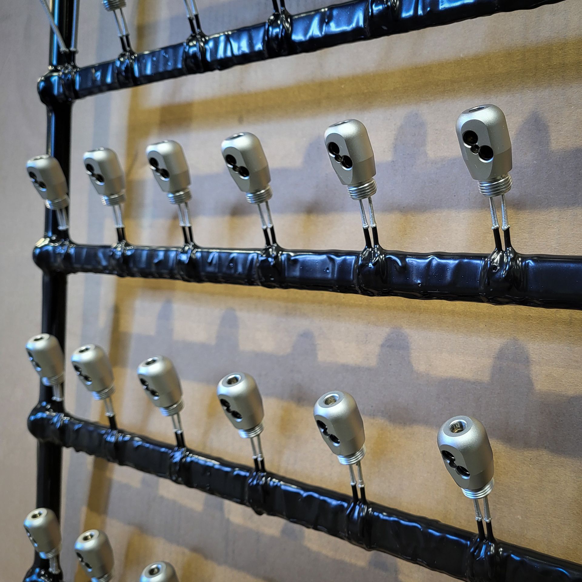 A person is polishing a car with a sander.