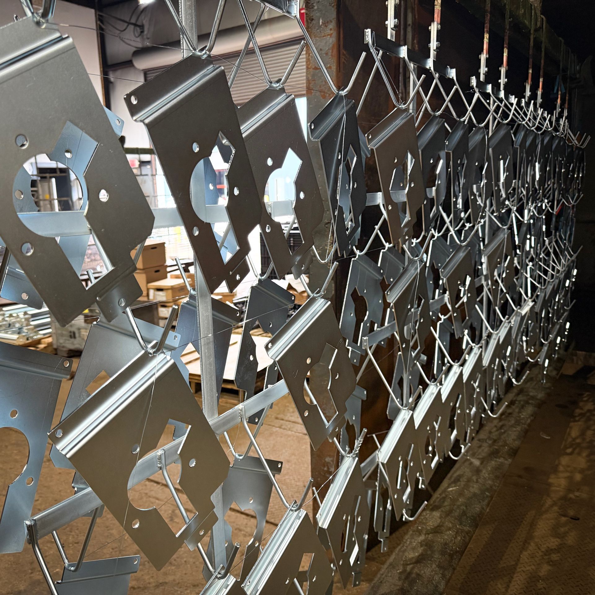 A machine is cutting a hole in a piece of metal.