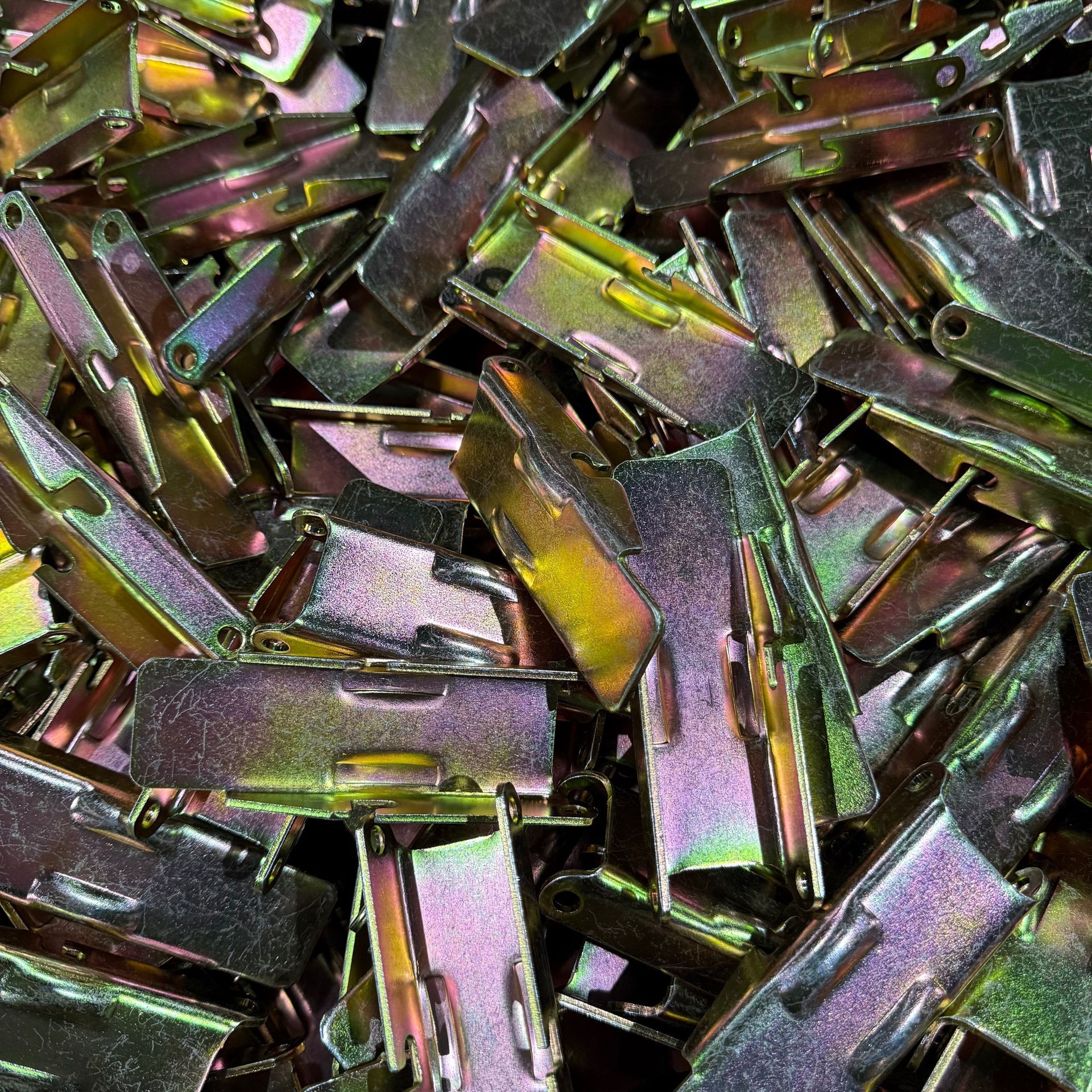 A man is working on a machine in a factory.