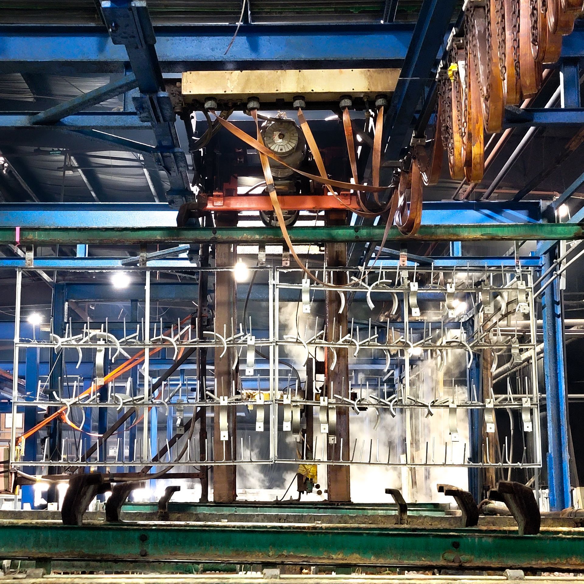 A stack of metal plates sitting on top of each other on a table.