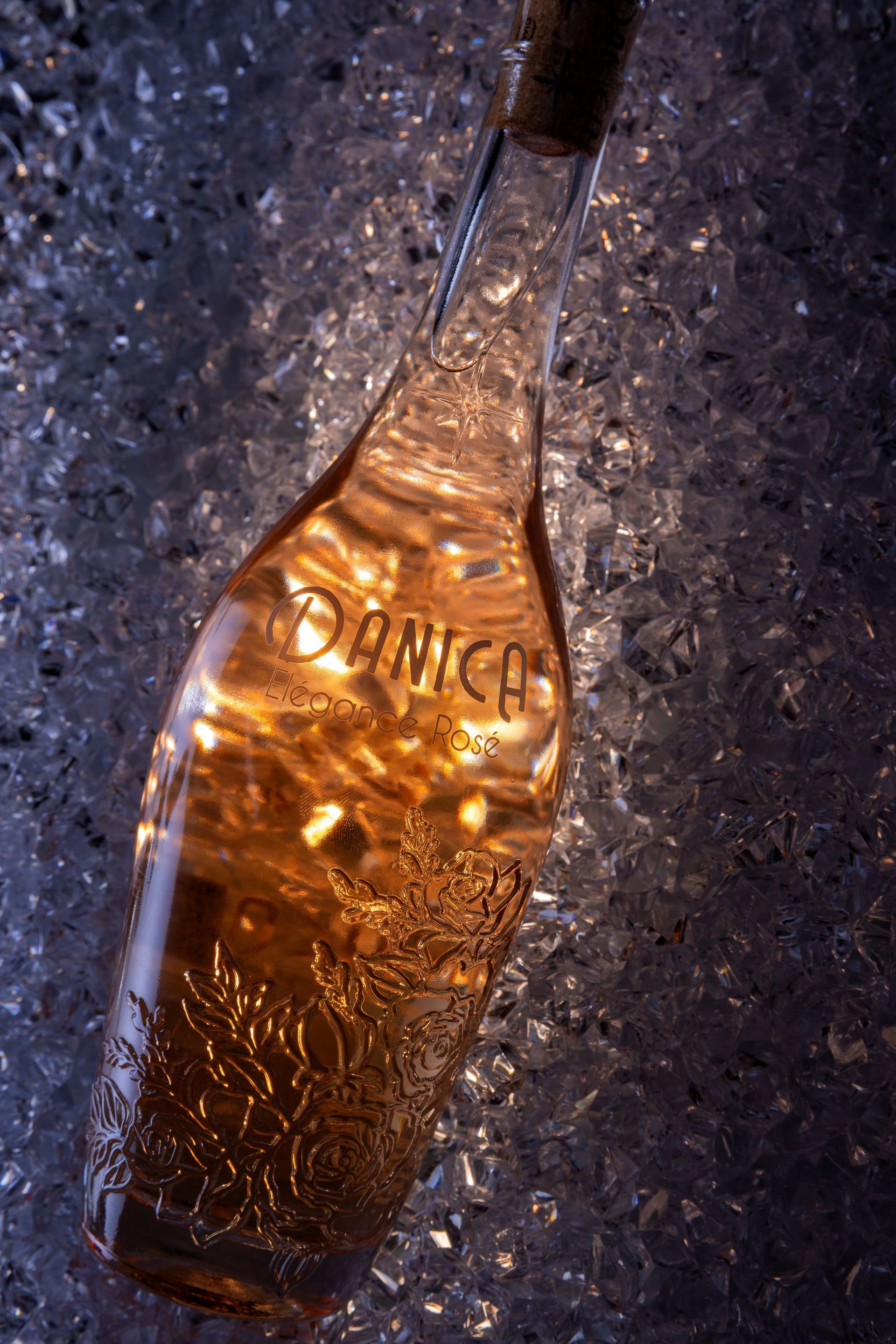 Bottle of amber liquid, labeled