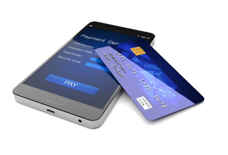 A credit card is sitting on top of a smart phone.