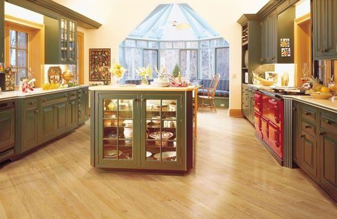 A hallway of beautiful parquet hardwood floors.