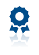 A blue award seal icon with a ribbon and a slight reflection beneath it.