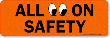 An orange horizontal sign with the words