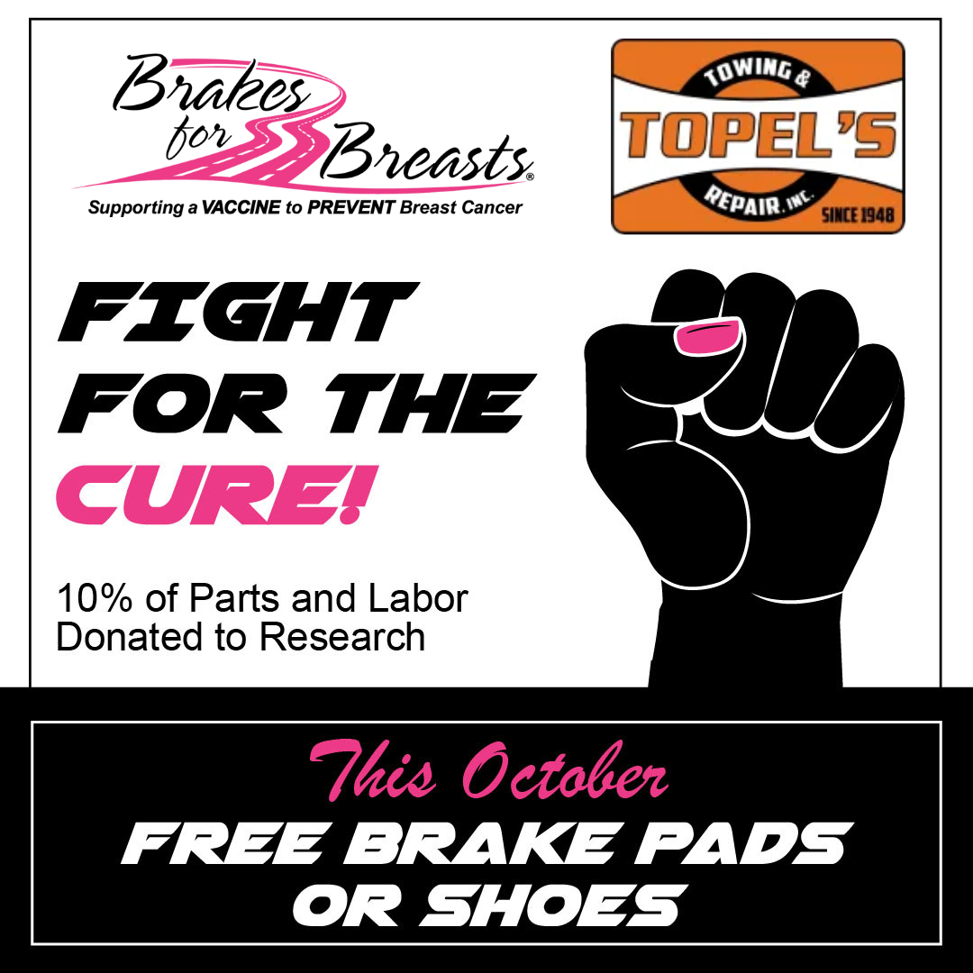 Topel's Towing & Repair signage supporting the Brakes for Breasts campaign