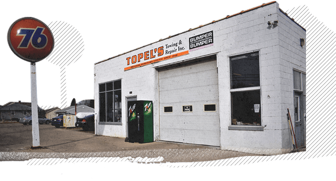 In Front of Topel's Towing & Repair, Inc. - Lake Mills Auto Repair
