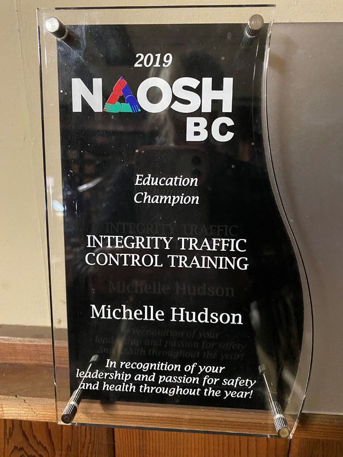 A plaque that says integrity traffic control training on it