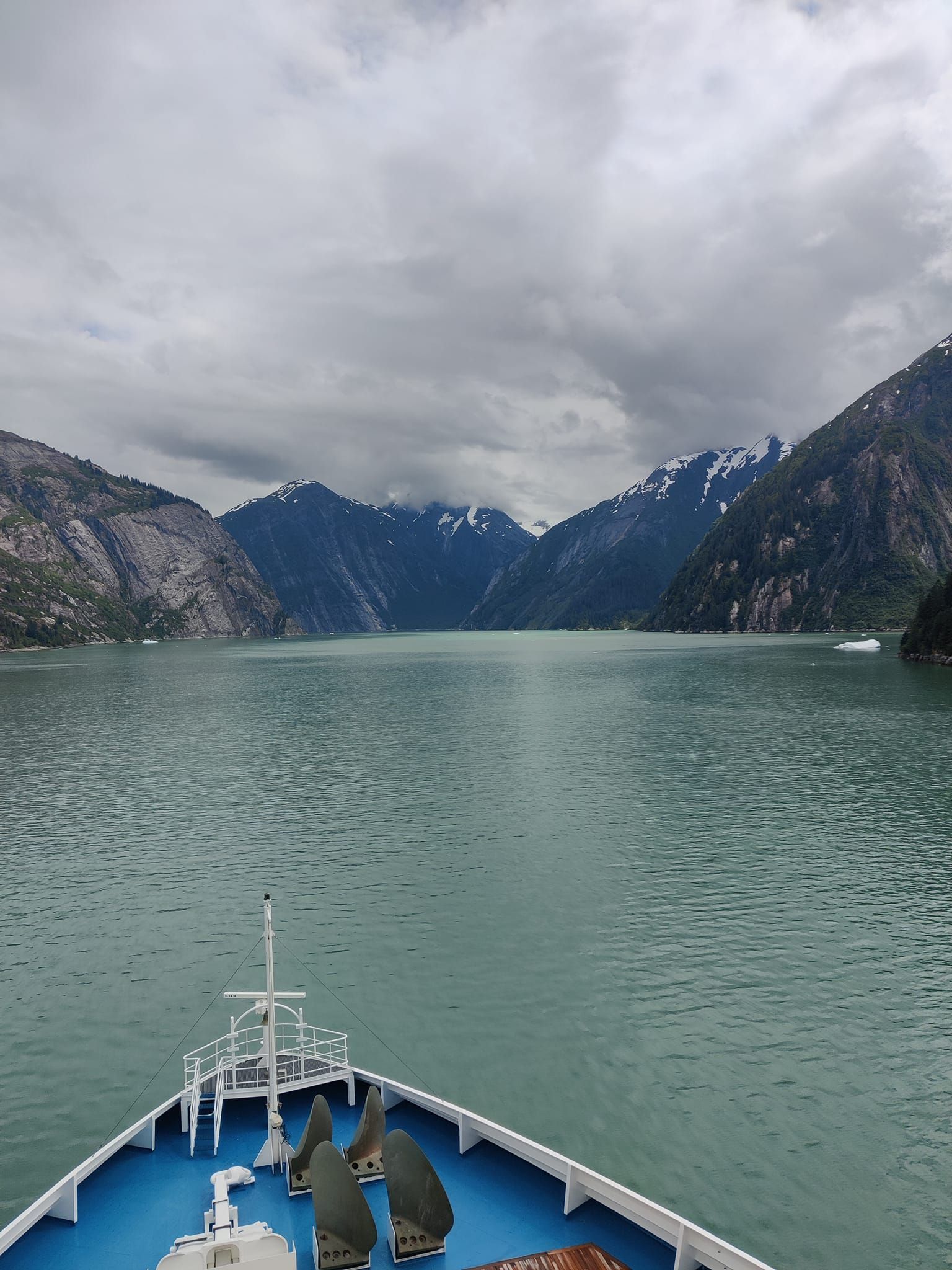 Alaska fjord entrance, taken from high on a ship with the bow in the photo