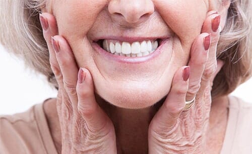 Senior Woman with Dentures—Cosmetic Dentistry in Fillmore, CA