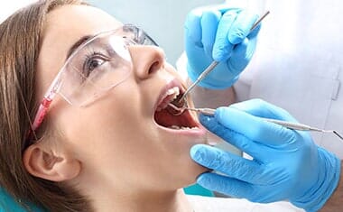 Dental Expert Examining Patients Teeth—Cosmetic Dentistry in Fillmore, CA