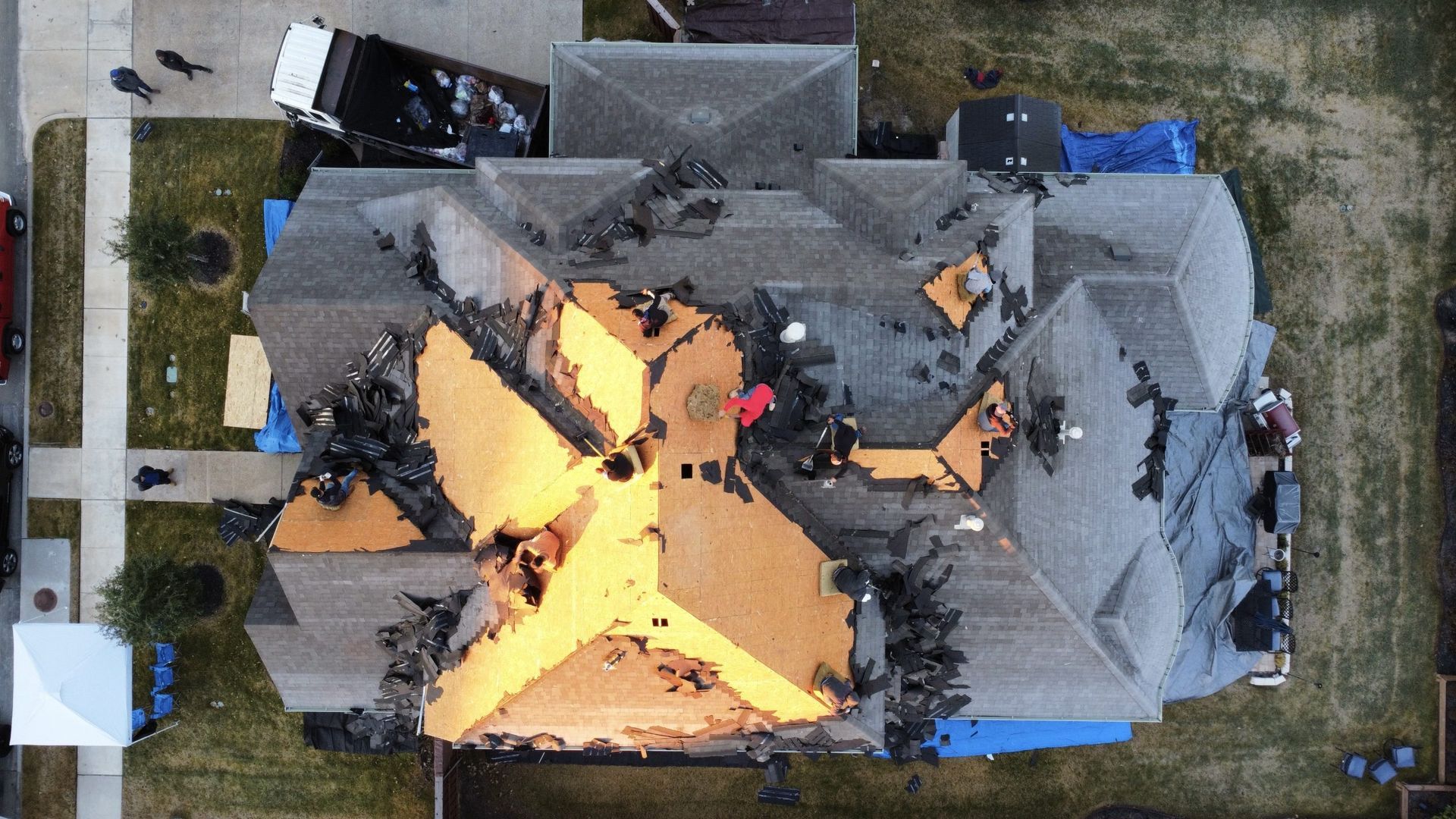 An aerial view of a house that has been damaged by a fire.