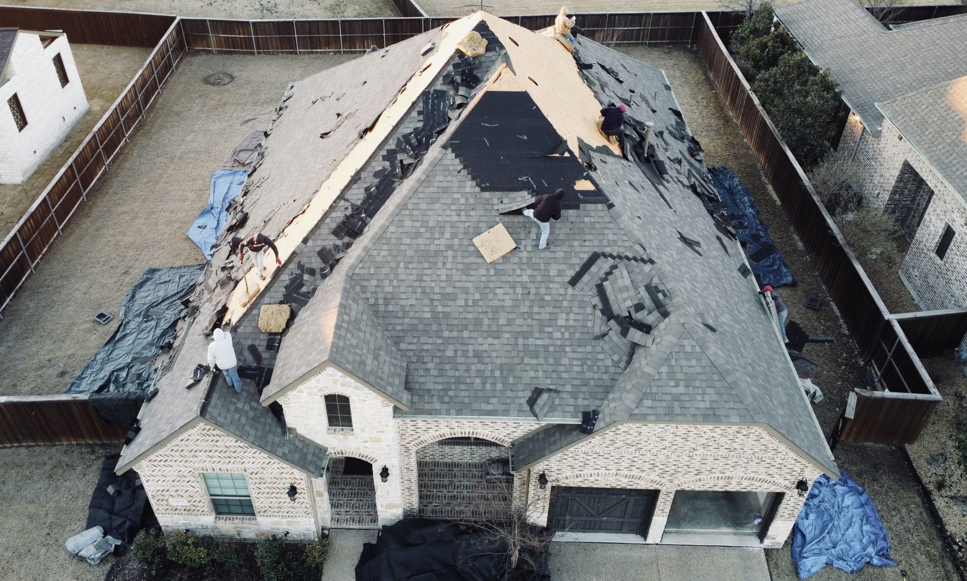An aerial view of a house that is being remodeled