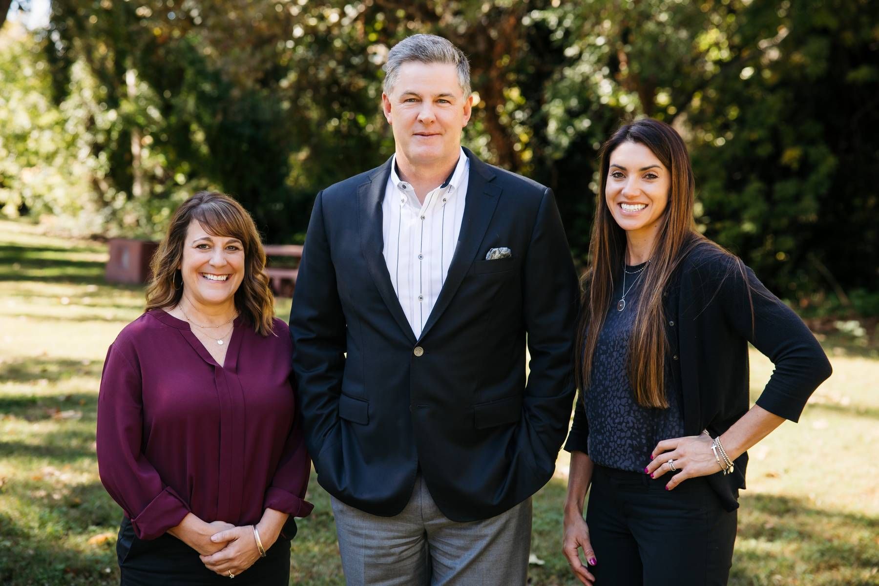 A beach with a lot of umbrellas and buildings in the background