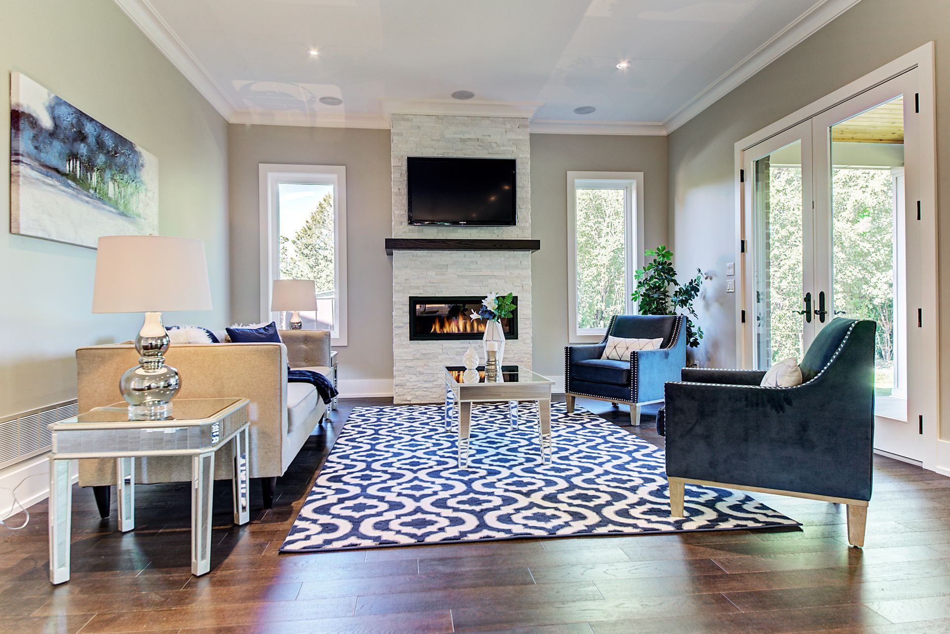 A living room filled with furniture and a fireplace.