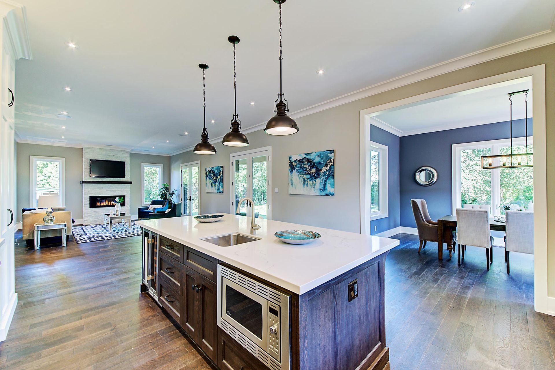 A kitchen with a large island in the middle of the room.
